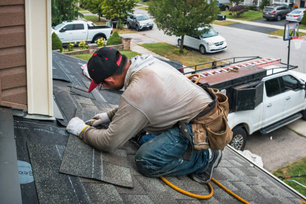 Professional Flat Roof Repair technician working in Woodmere, NY